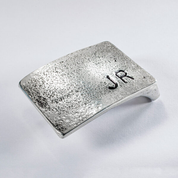 Belt buckle with initials JR