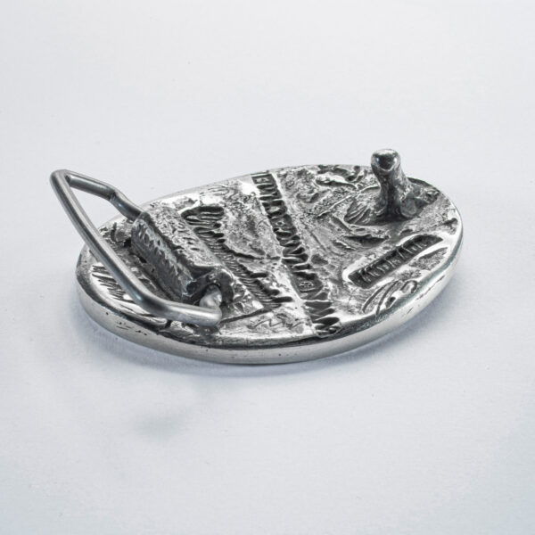 Gürtelschließe oder Gürtelschnalle, Motiv "Sylt", Format oval klein erhaben 6 x 5 cm, Rückseite. Handarbeit von Neptunsgeschmeide.