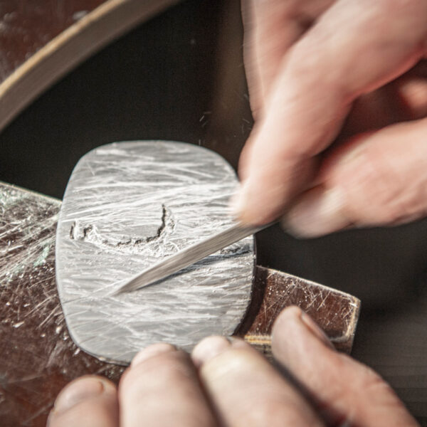 Production of the model of the Sylt belt buckle. View of the work table.