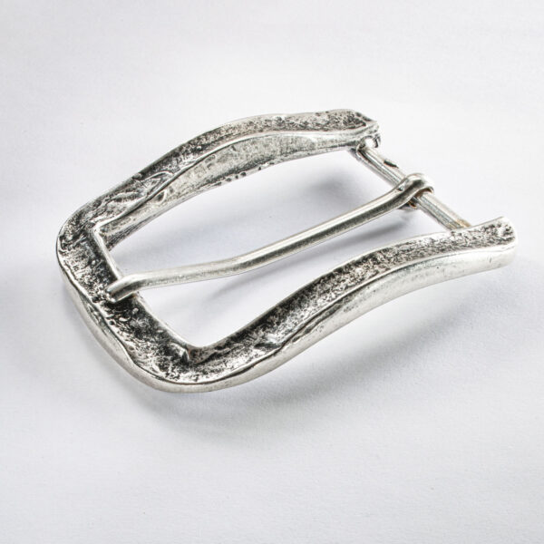 Simple buckle surf from Neptune jewelry. Old silver, electroplated with silver. Dimensions approx. 7,5 x 5 cm.