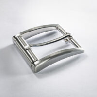 Modell rullad rosett, 6 x 5 cm. Satinsilver, galvaniserat silver.