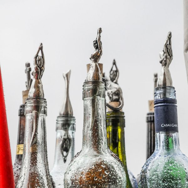 Bild zeigt mehrere Meerjungfrau Flaschenverschlüsse, Flaschenixe.