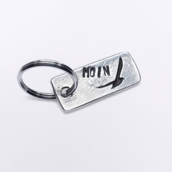 Small key ring with a flying seagull and Moin embossing, 2 x 4,5 cm, from NeptunsSchmeiße.