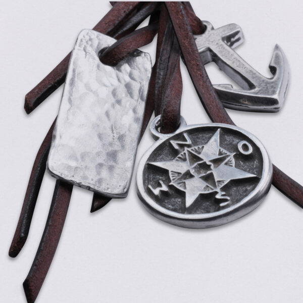 Gebamsel® pendant crown and compass, detail image, from Neptune jewelry. Bag or key ring with snap hook small.