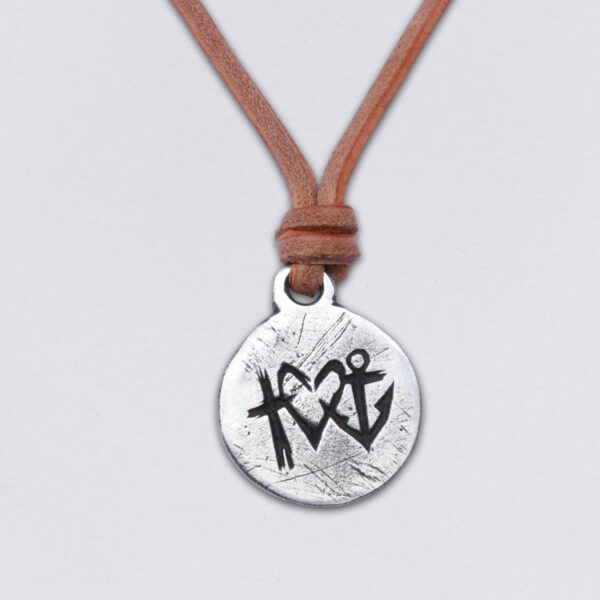 Necklace Faith Love Hope on a leather cord by Neptune Jewels. Pendant size: about 3 cm in diameter. detail picture. brown leather 4 mm.