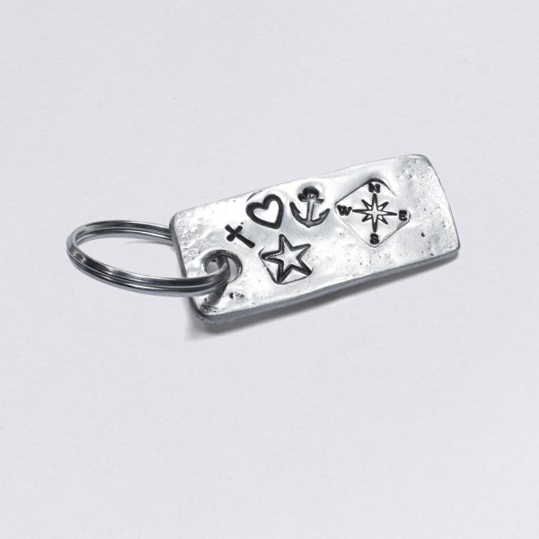 Key ring with many symbols, pewter, dimensions: approx. 2 x 4,5 cm, made by Neptune Jewels. Customizable with desired embossing.